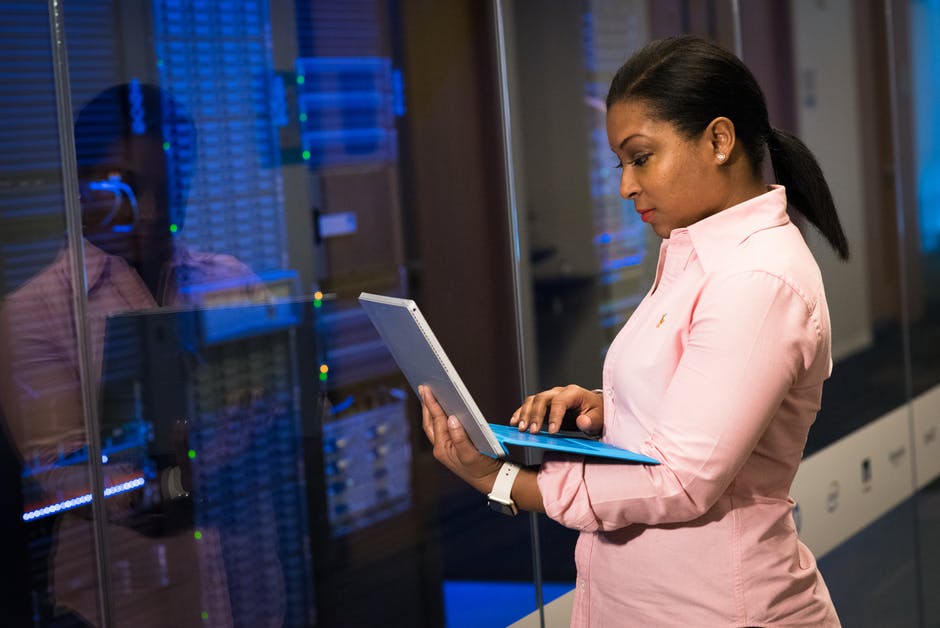 woman working with colocation servers