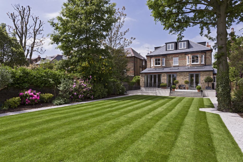 Custom Dream Home with Sprawling Green Lawn