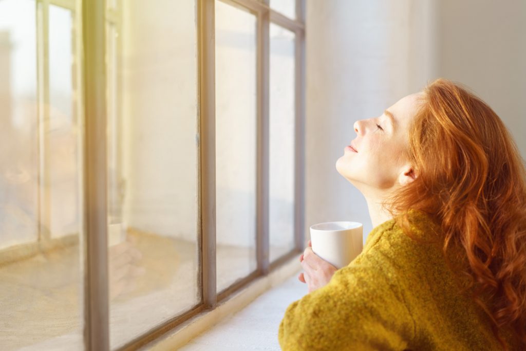 Woman Satisfied with DIY Window Replacement