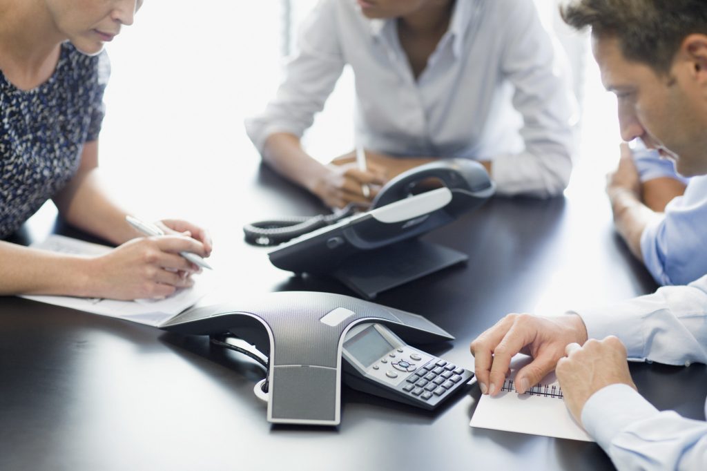 People on a Business Meeting via Conference Call